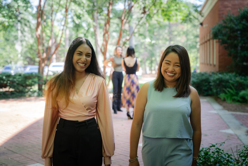 A photo of International Officers Britney Khan and Monserrat Rivero Sanchez who took advantage of their PTK membership to run for international office and reach new heights.