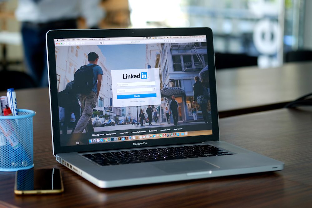 laptop showing linkedin logo