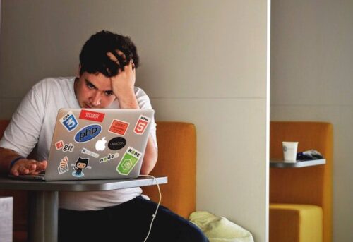 Anxious Student at Laptop