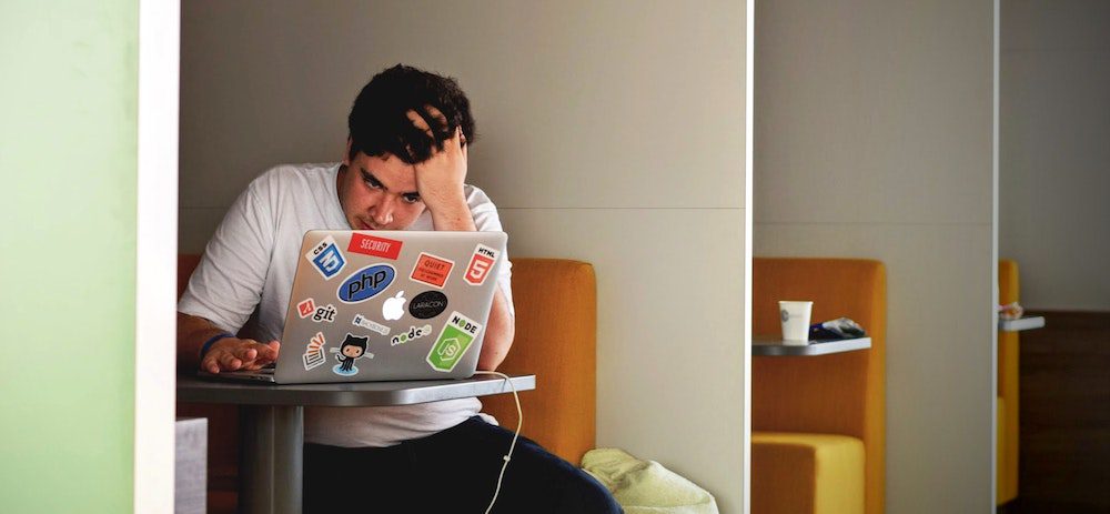 Anxious Student at Laptop