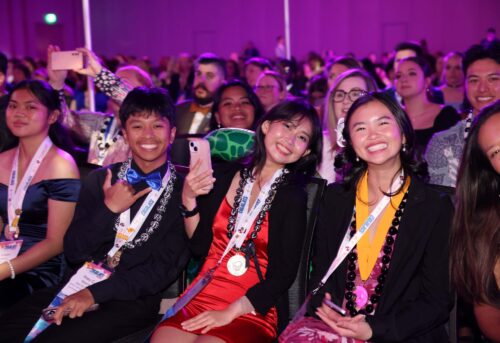 PTK members with their advisor at Catalyst